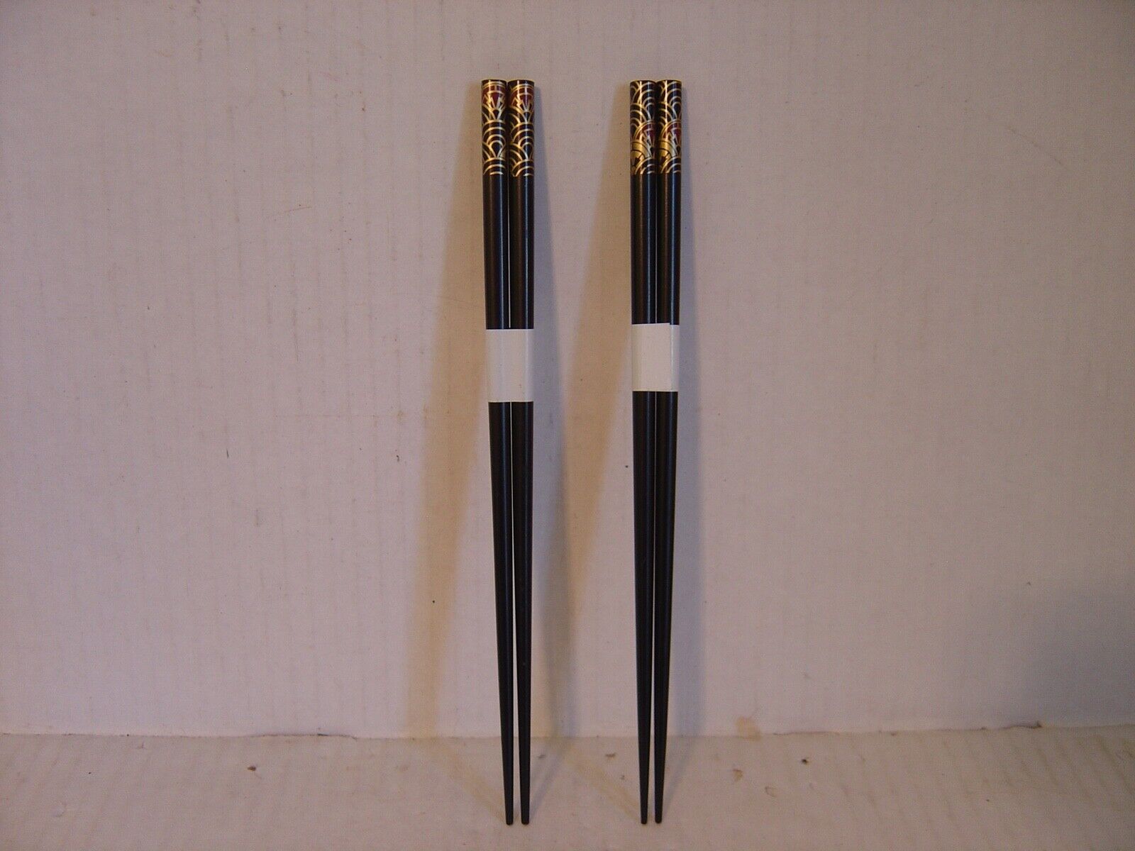 Vintage Two Pair Of Asian Black Enamel Chopsticks With Gold Design And Two Rests